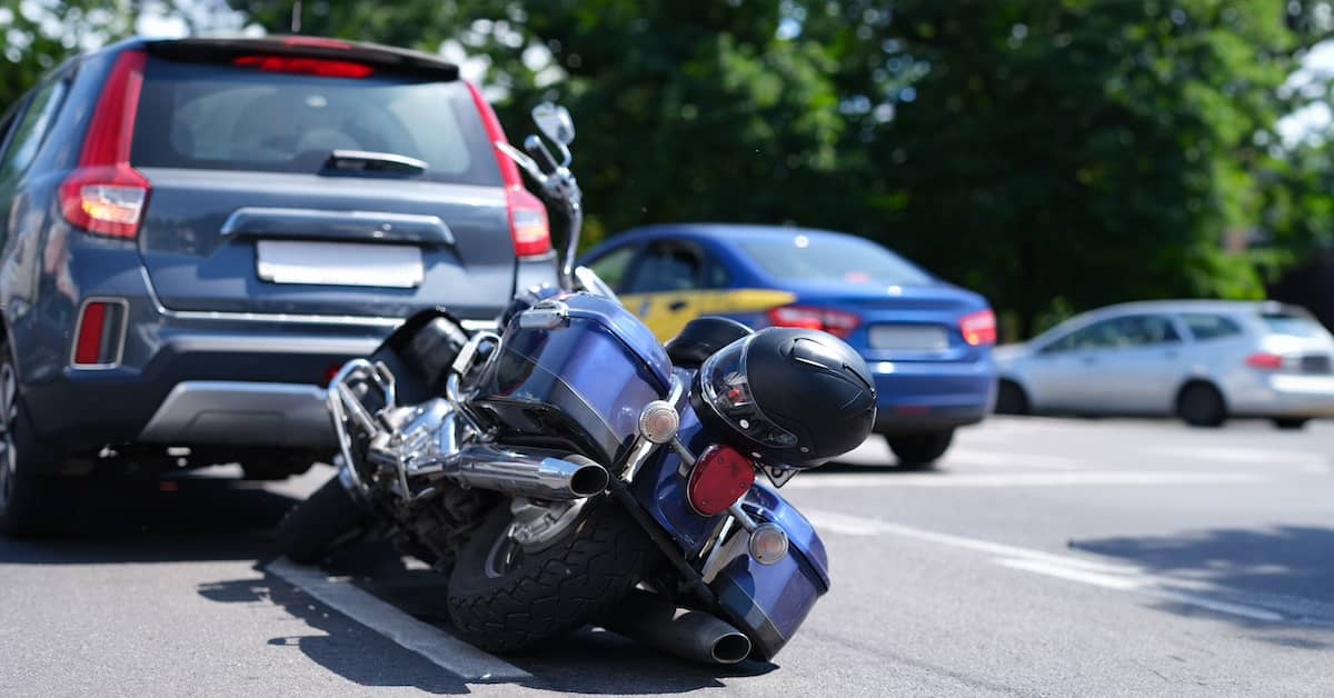 Car and motorcycle involved in road accident | Henry Carus + Associates